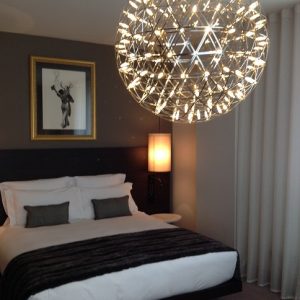 Bedroom with fab chandelier