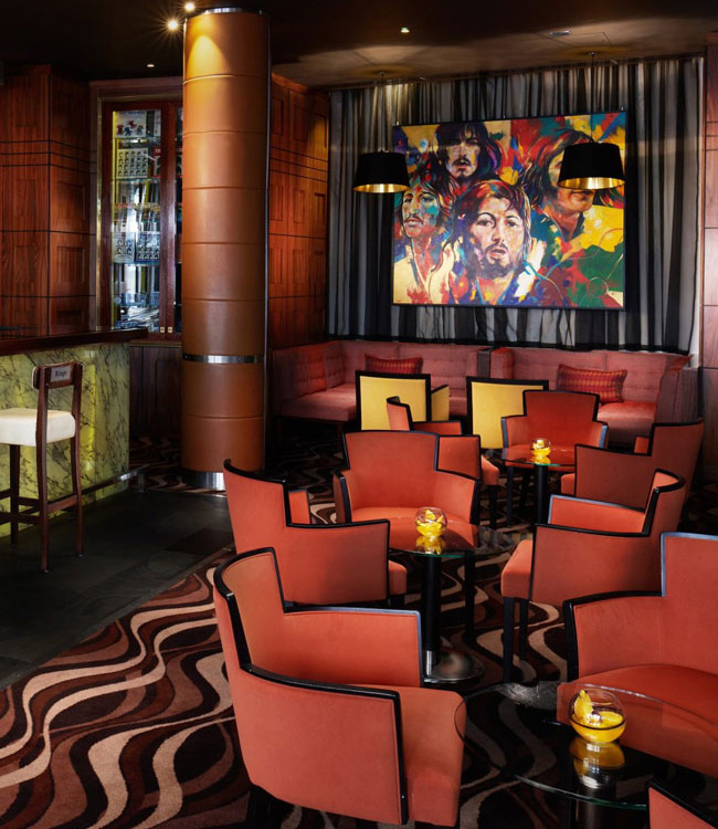 Chairs and small tables arranged in a modern bar for an event