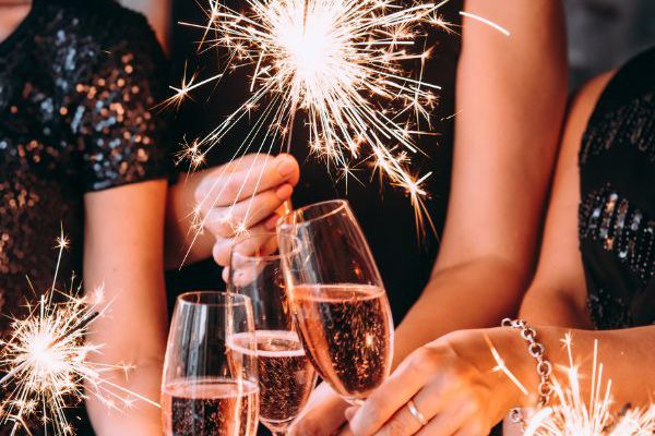 Closeup of champagne and sparklers at a corporate party event