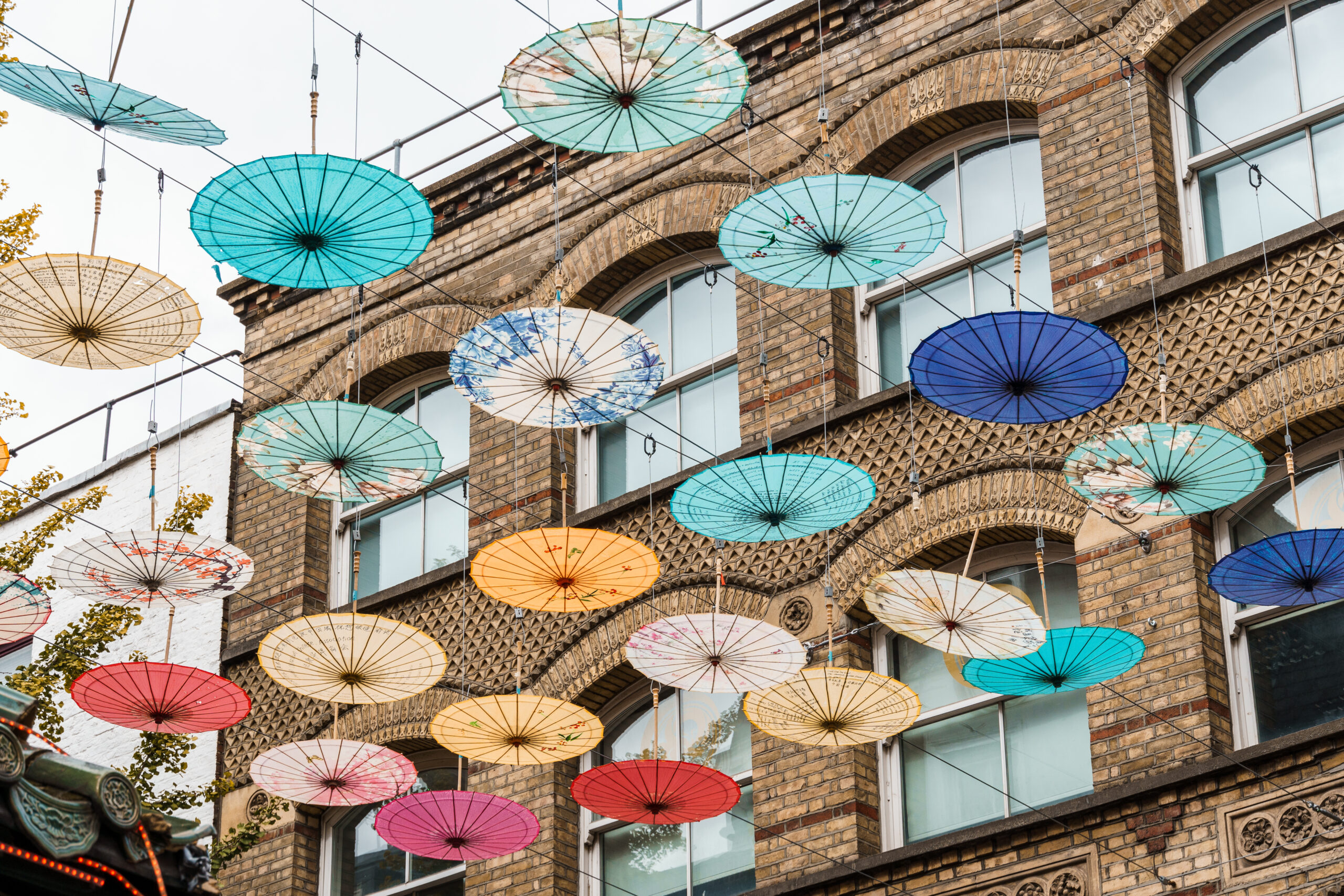 Umbrellas hanging over street in Chinatown in London